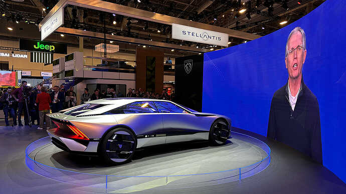 Peugeot Inception Concept and Stellantis CEO Carlos Tavares.