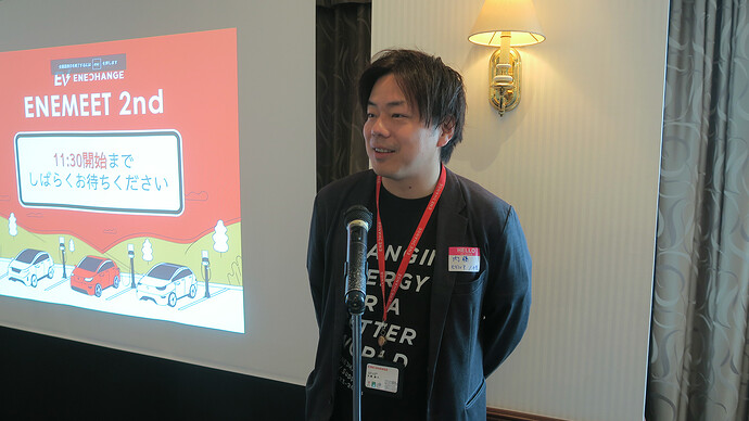 2025年1月のENEMEET2（EVサポーターズへの感謝イベント）で挨拶する内藤さん。