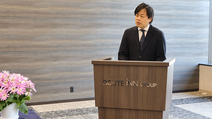 EV LIFE事業本部の内藤義久本部長がルートインジャパンへの感謝の挨拶。