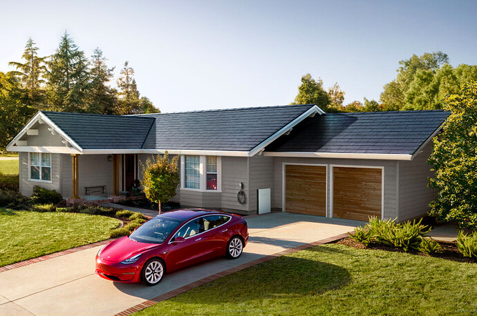 テスラのSolar Roofを備えた住宅。太陽光発電パネルが「いかにも載っている」といった従来の物とは全く異なる外観が特徴だ。テスラの公式サイトより転載。