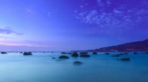 Peaceful and tranquil nature landscape of sea coast after sunset